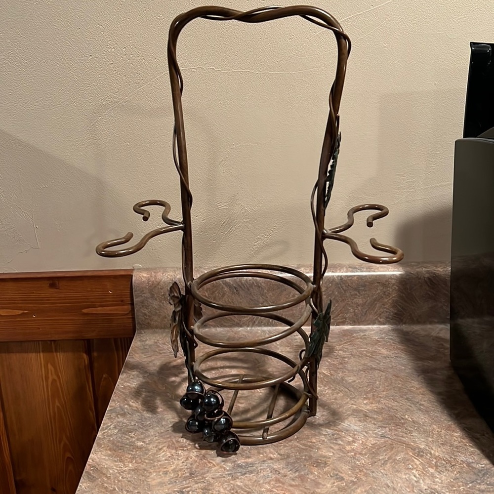 Wine bottle and glass holder.